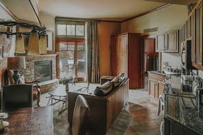 Flat-screen TV, fireplace