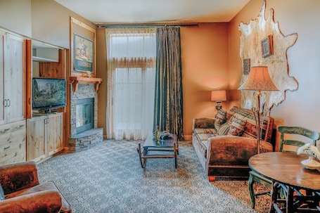 Flat-screen TV, fireplace