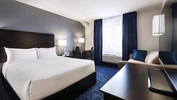 Ropa de cama de alta calidad, minibar y escritorio