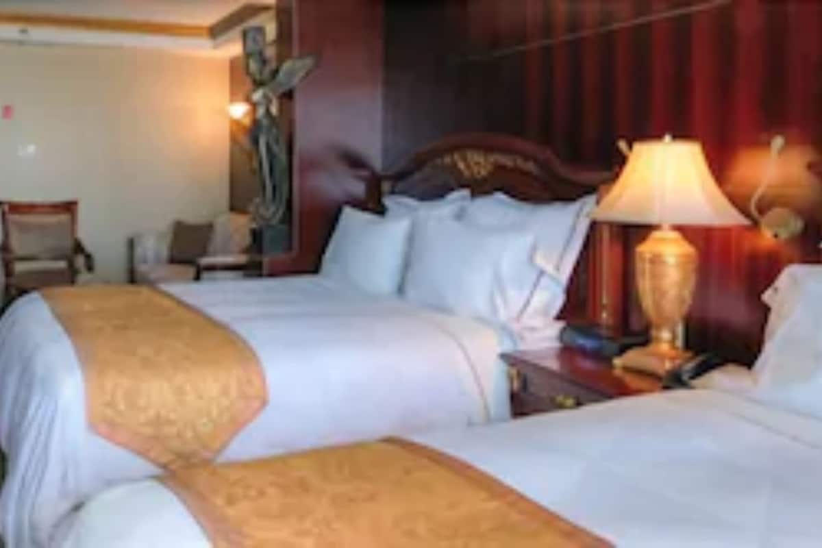 Premium bedding, down comforters, Select Comfort beds, in-room safe