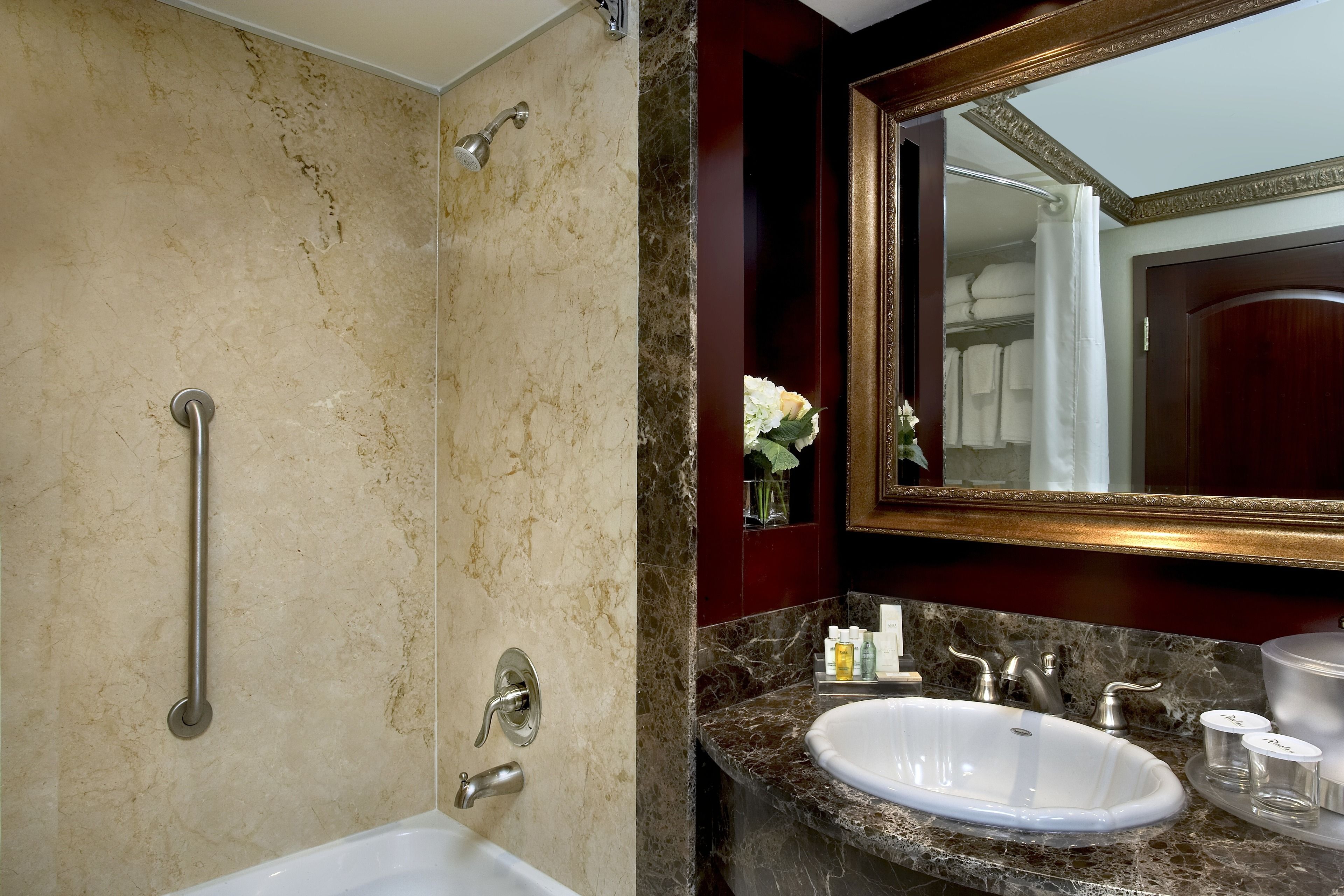 combined shower/bathtub, free toiletries, hair dryer, towels