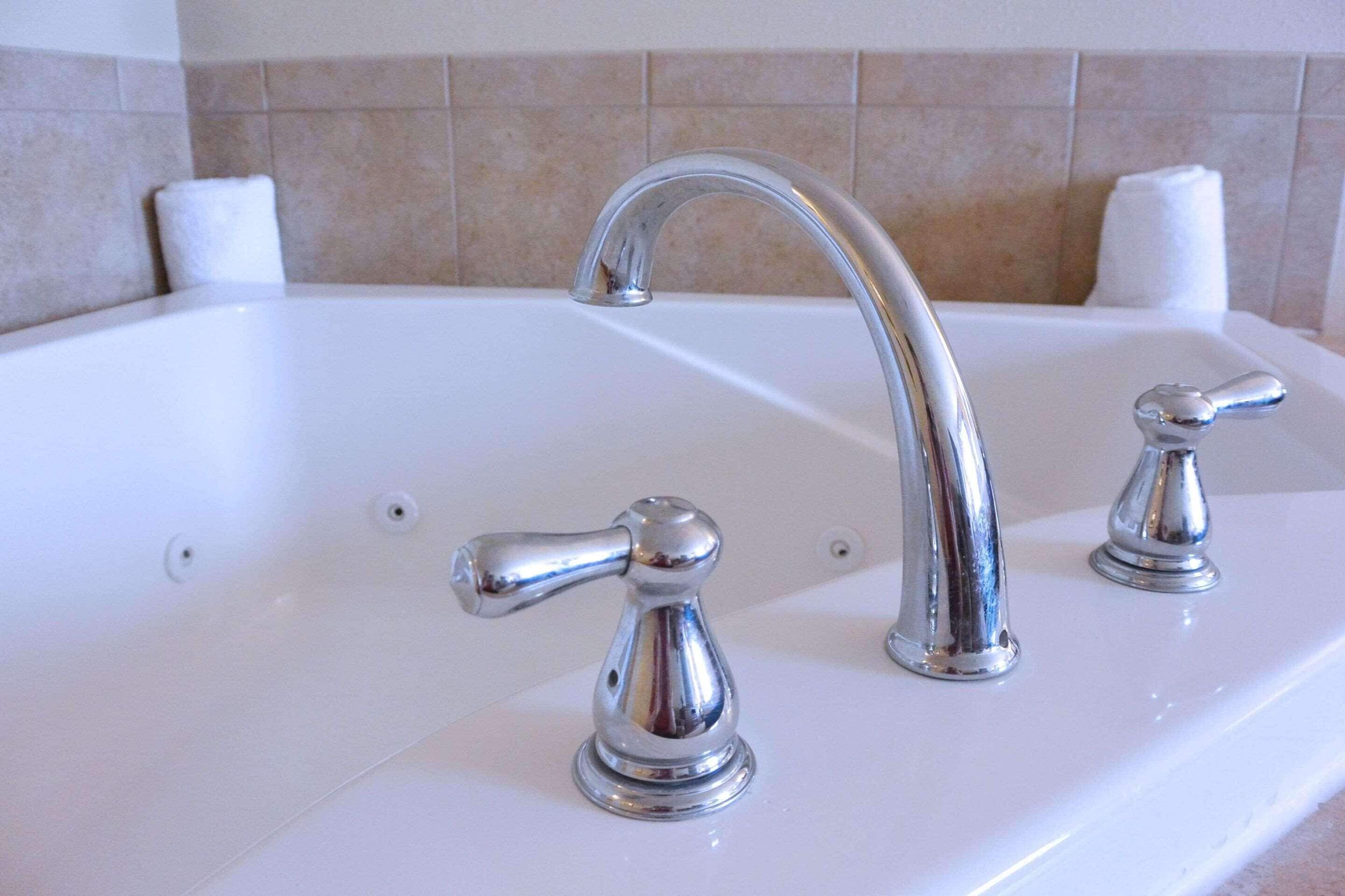 suite, 1 king bed, non smoking, jetted tub | desk, laptop workspace, blackout curtains, iron/ironing board