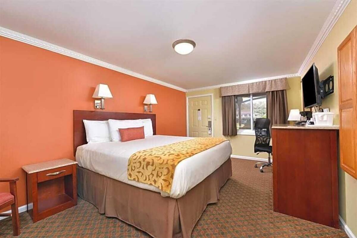 Blackout drapes, iron/ironing board, WiFi (free), alarm clocks