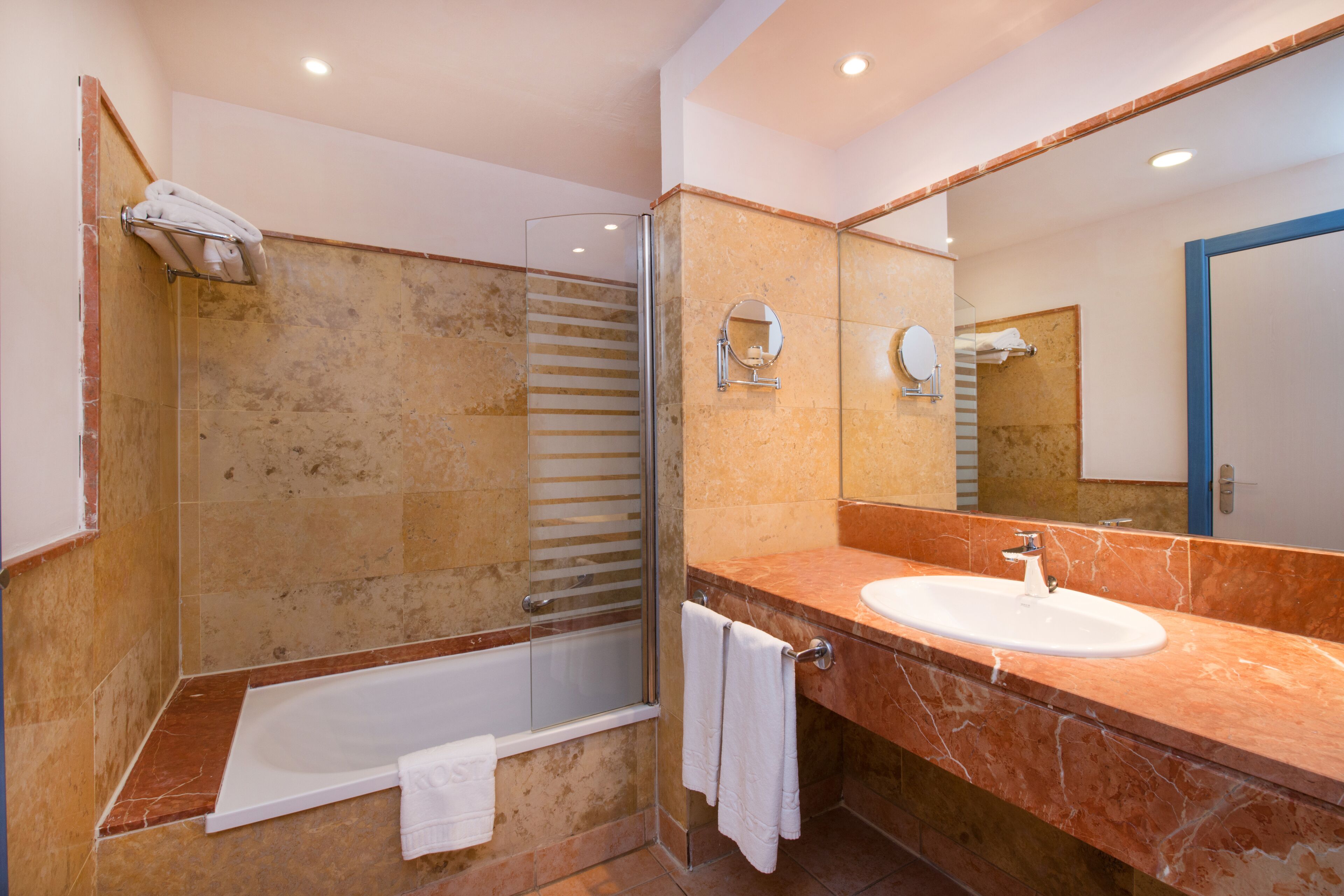 eco-friendly toiletries, hair dryer, bidet, towels