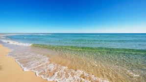 A beach with clear water and a sandy shore. - Iberostar Waves Playa Gaviotas -All Inclusive (Pajara)
