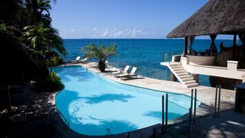Outdoor pool, pool umbrellas, pool loungers