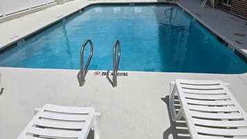 Seasonal outdoor pool, pool loungers
