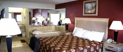 Deluxe Suite, 1 King Bed, Jetted Tub | Desk, iron/ironing board, free WiFi, bed sheets