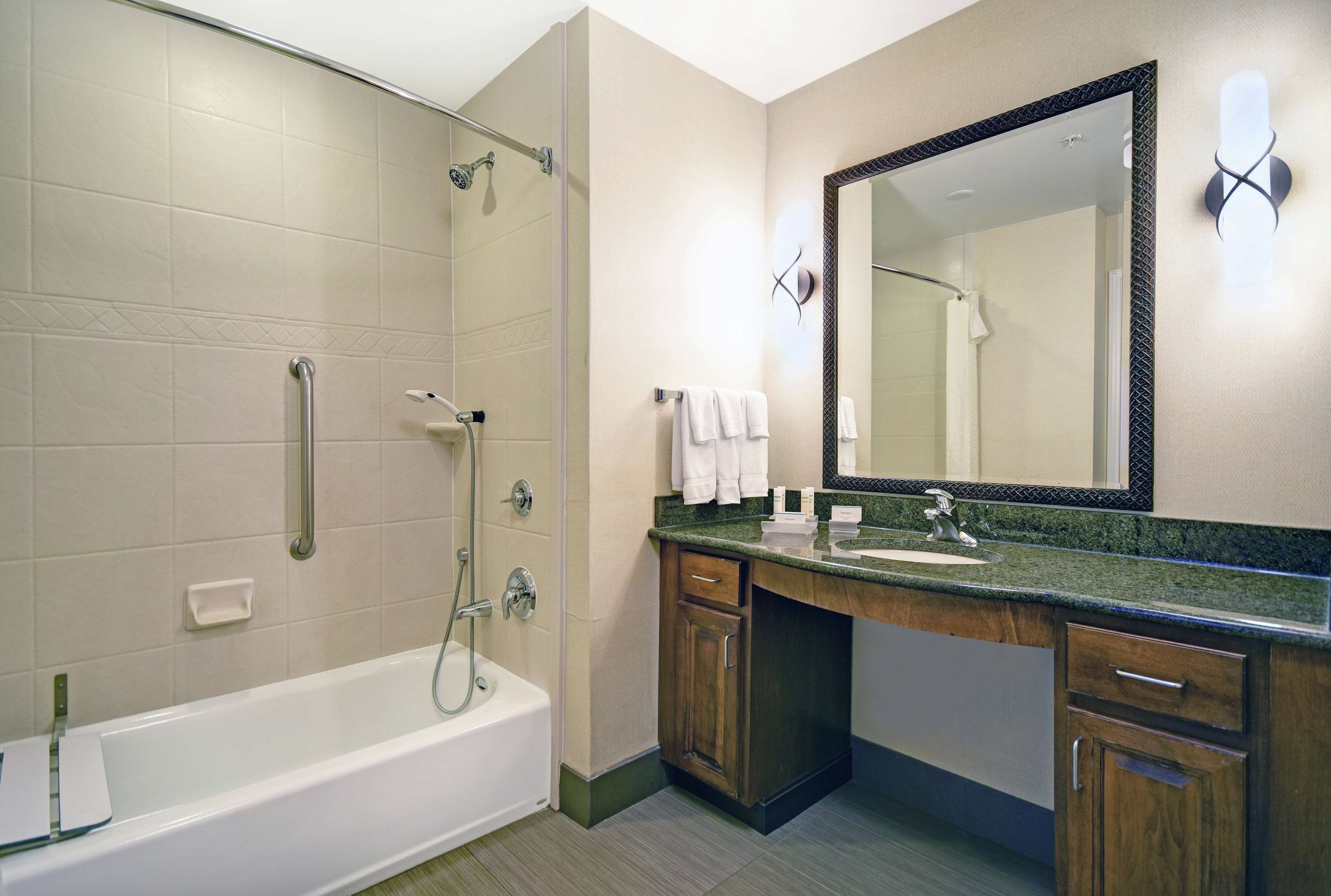 combined shower/bathtub, eco-friendly toiletries, hair dryer, towels