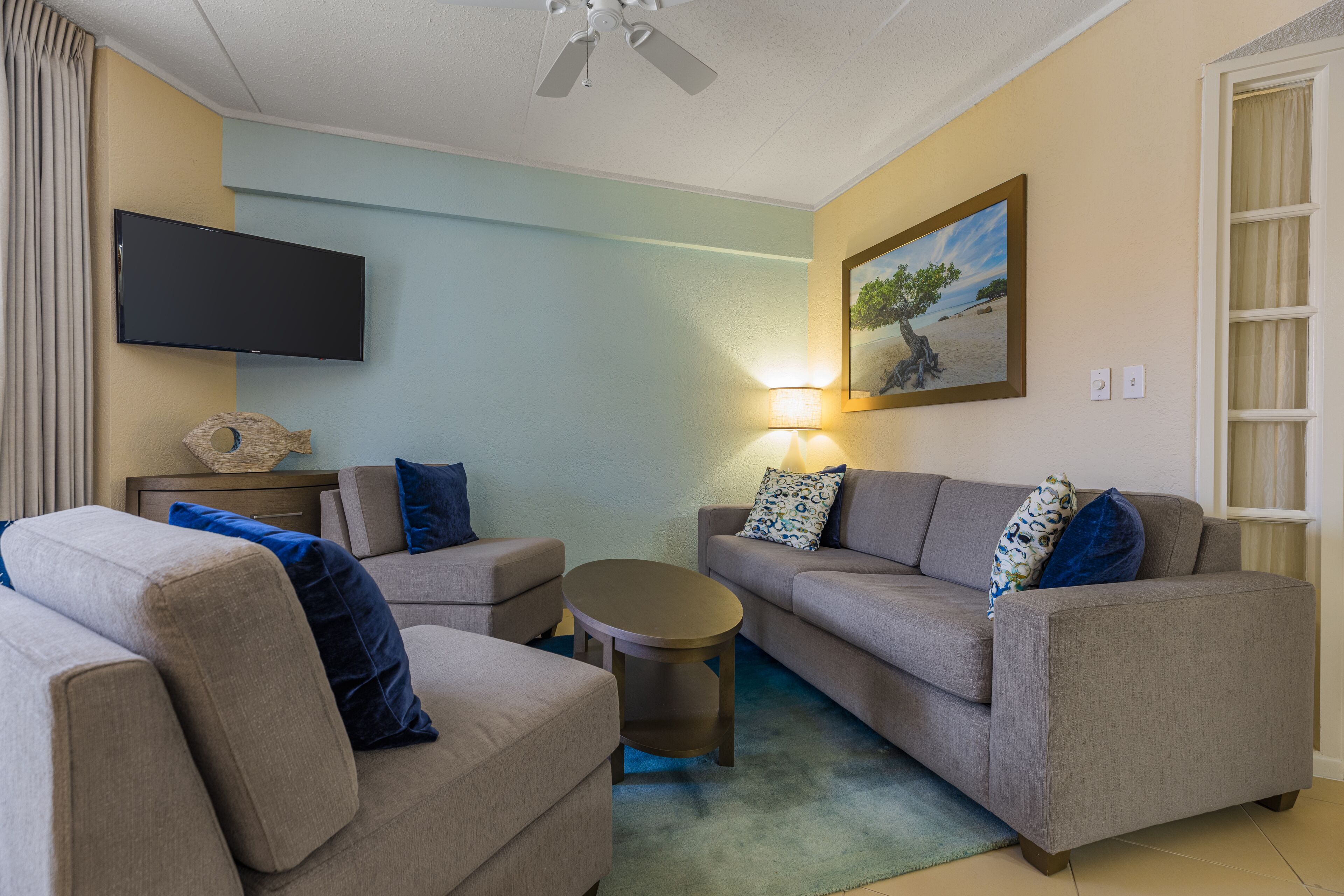suite, 1 bedroom | living area | 24-inch plasma tv with cable channels, tv