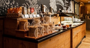 A breakfast buffet with various food items and beverages. - Berghotel Hammersbach, Sure Hotel Collection by Best Western (Grainau)