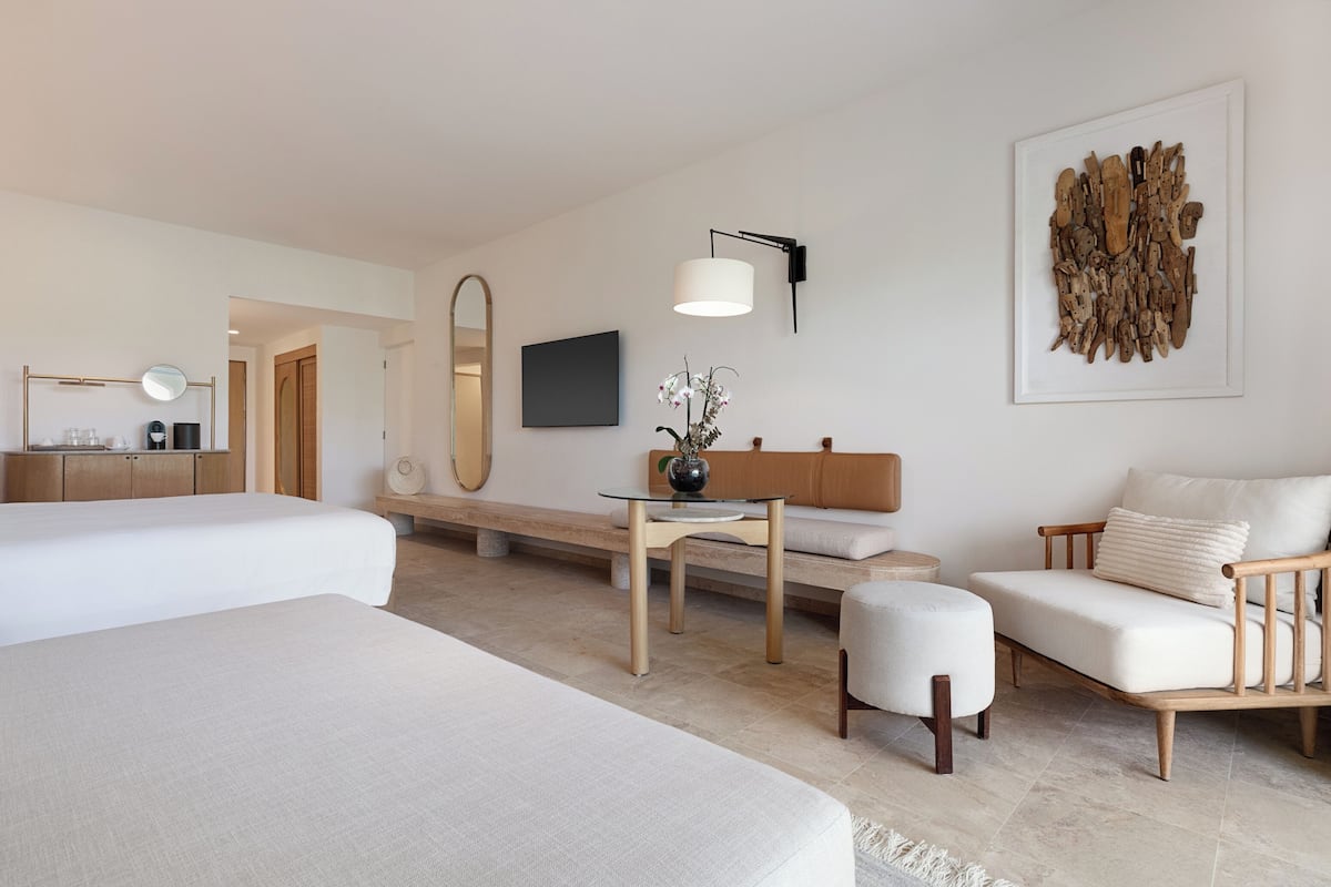 Free minibar, in-room safe, blackout curtains, iron/ironing board
