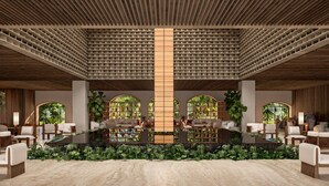 A spacious lobby with a central table, seating arrangements, and large windows with greenery visible through them. - Hacienda Tres Rios Resort, Spa & Nature Park-All Inclusive (Playa del Carmen)