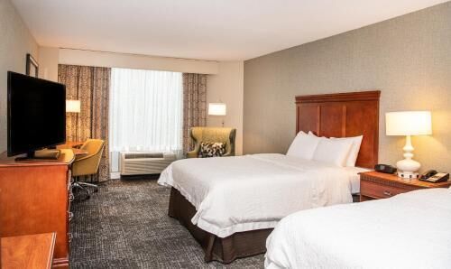 Premium bedding, down comforters, pillowtop beds, in-room safe