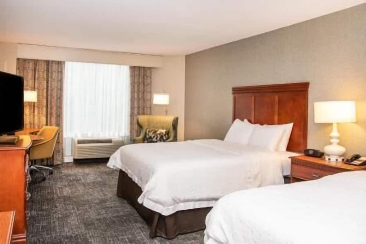 Premium bedding, down comforters, pillowtop beds, in-room safe