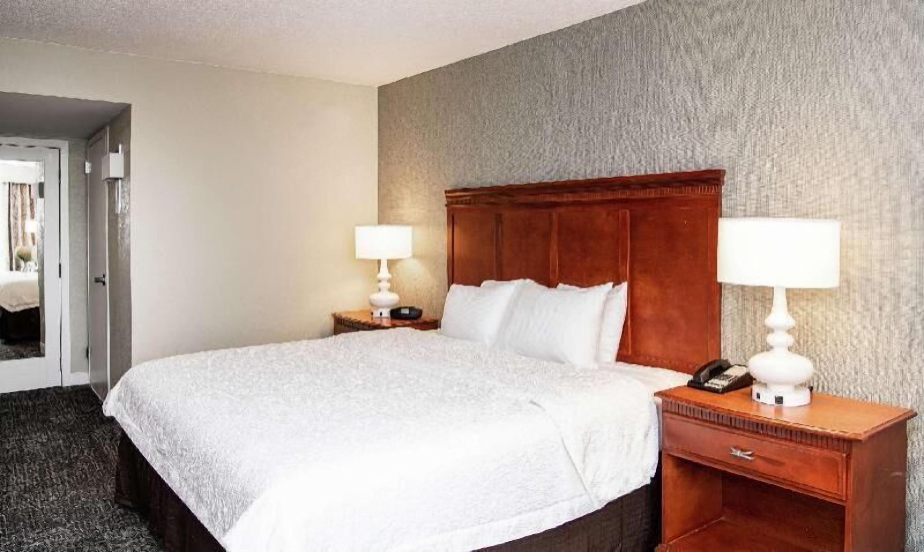 Premium bedding, down comforters, pillowtop beds, in-room safe