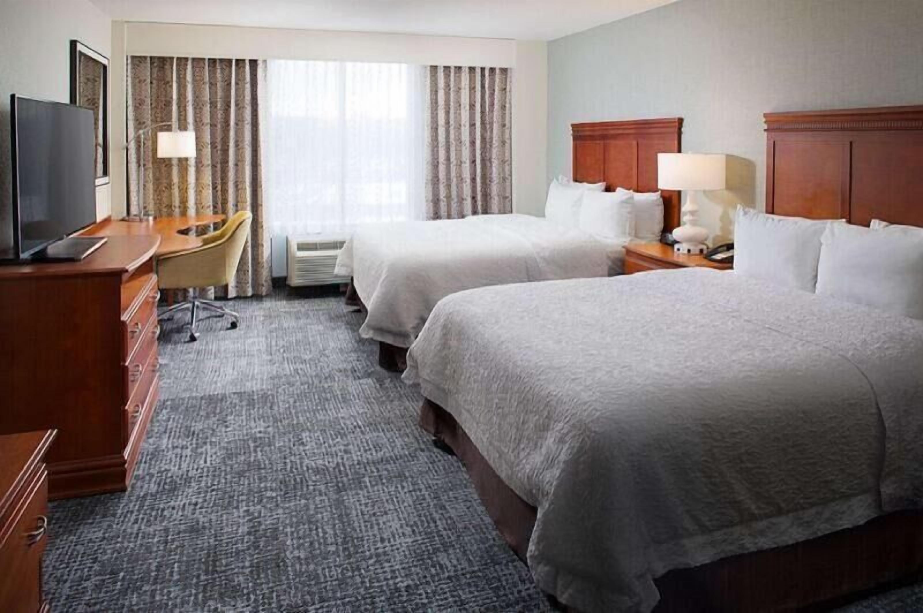 Premium bedding, down comforters, pillowtop beds, in-room safe