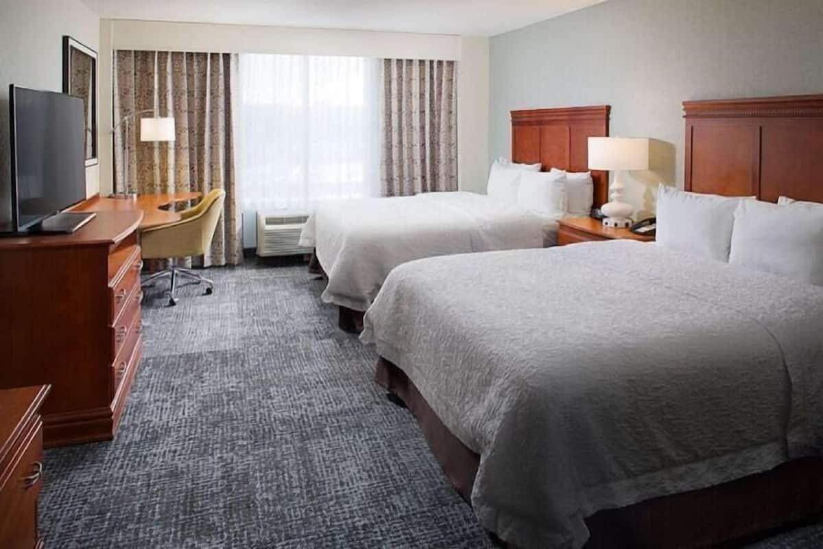 Premium bedding, down comforters, pillowtop beds, in-room safe