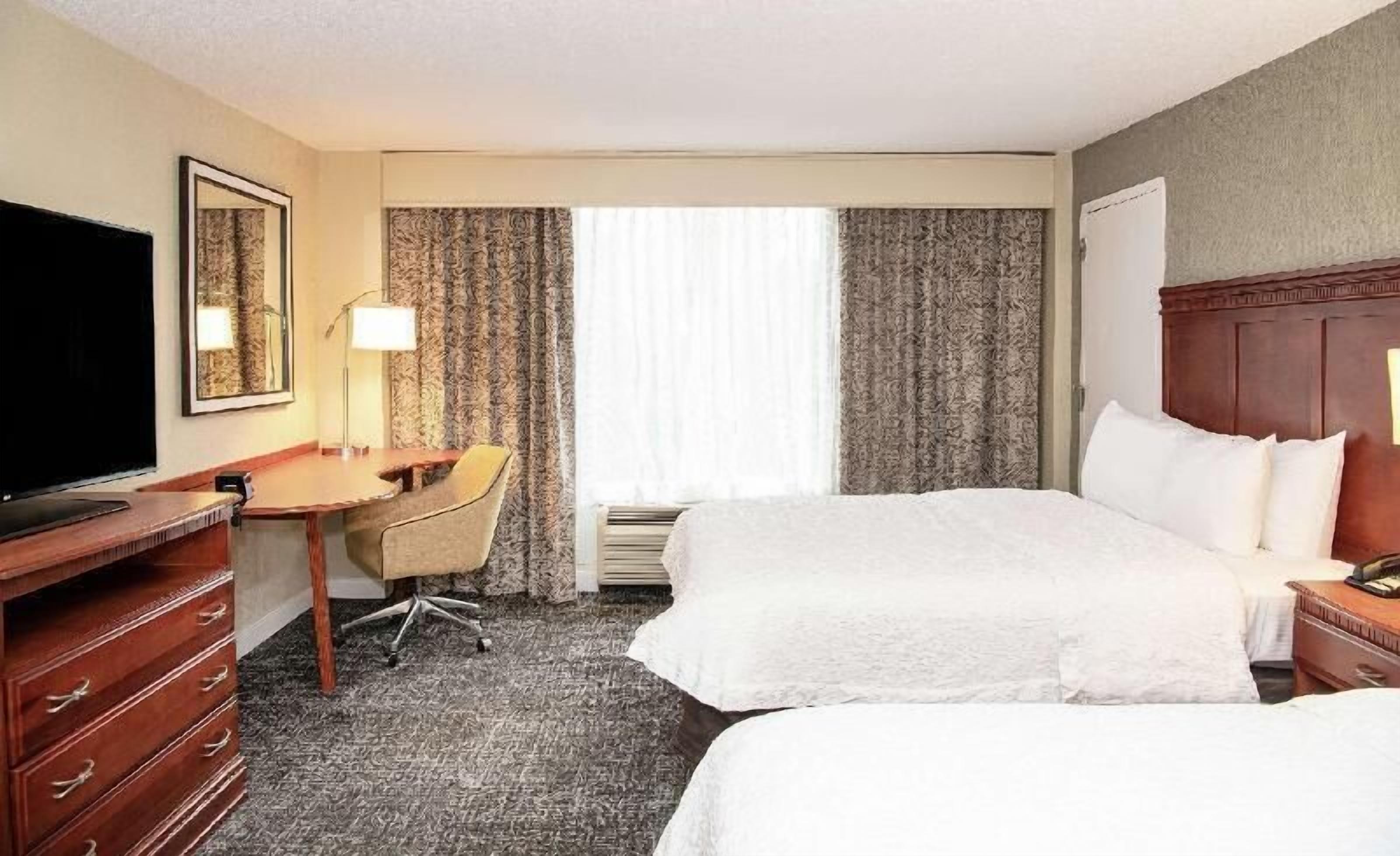 Premium bedding, down comforters, pillowtop beds, in-room safe