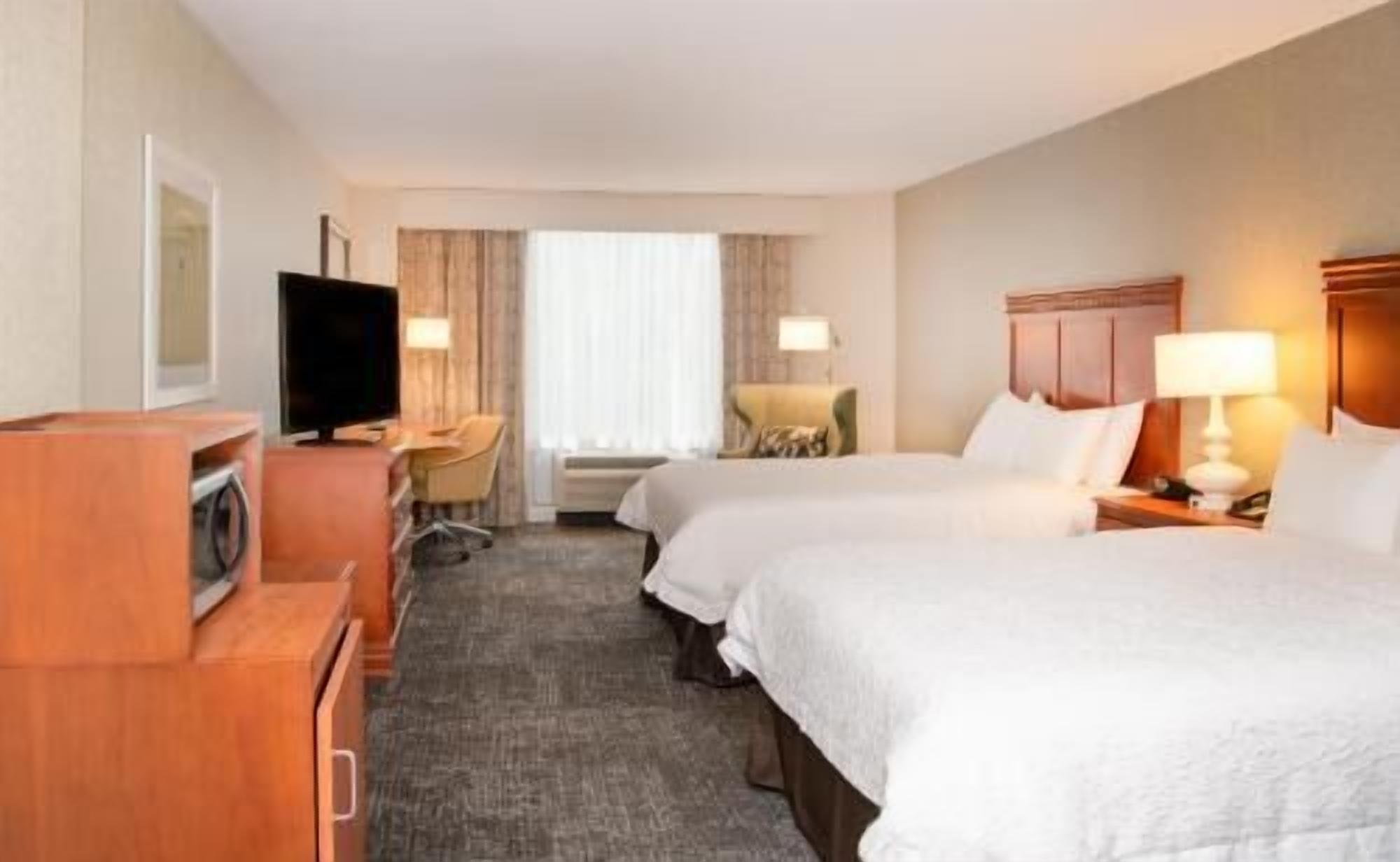 Premium bedding, down comforters, pillowtop beds, in-room safe