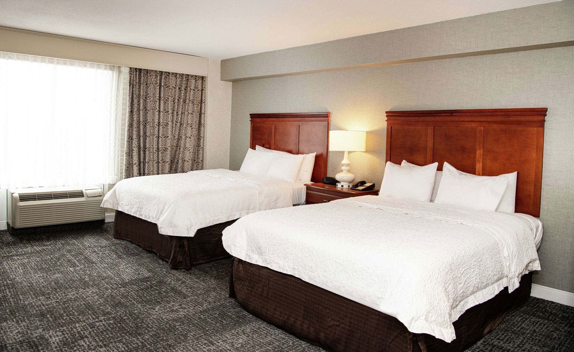 Premium bedding, down comforters, pillowtop beds, in-room safe