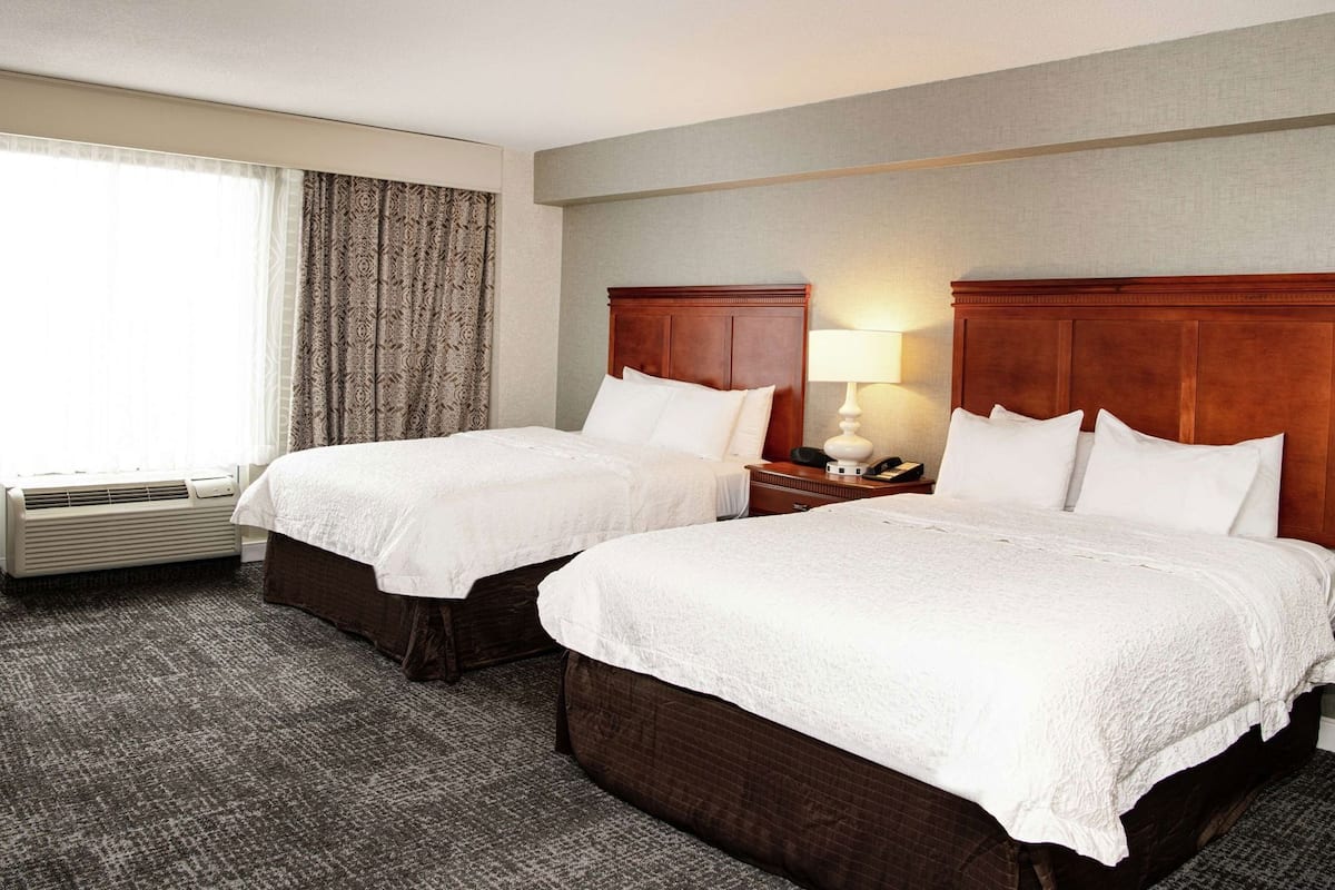 Premium bedding, down comforters, pillowtop beds, in-room safe