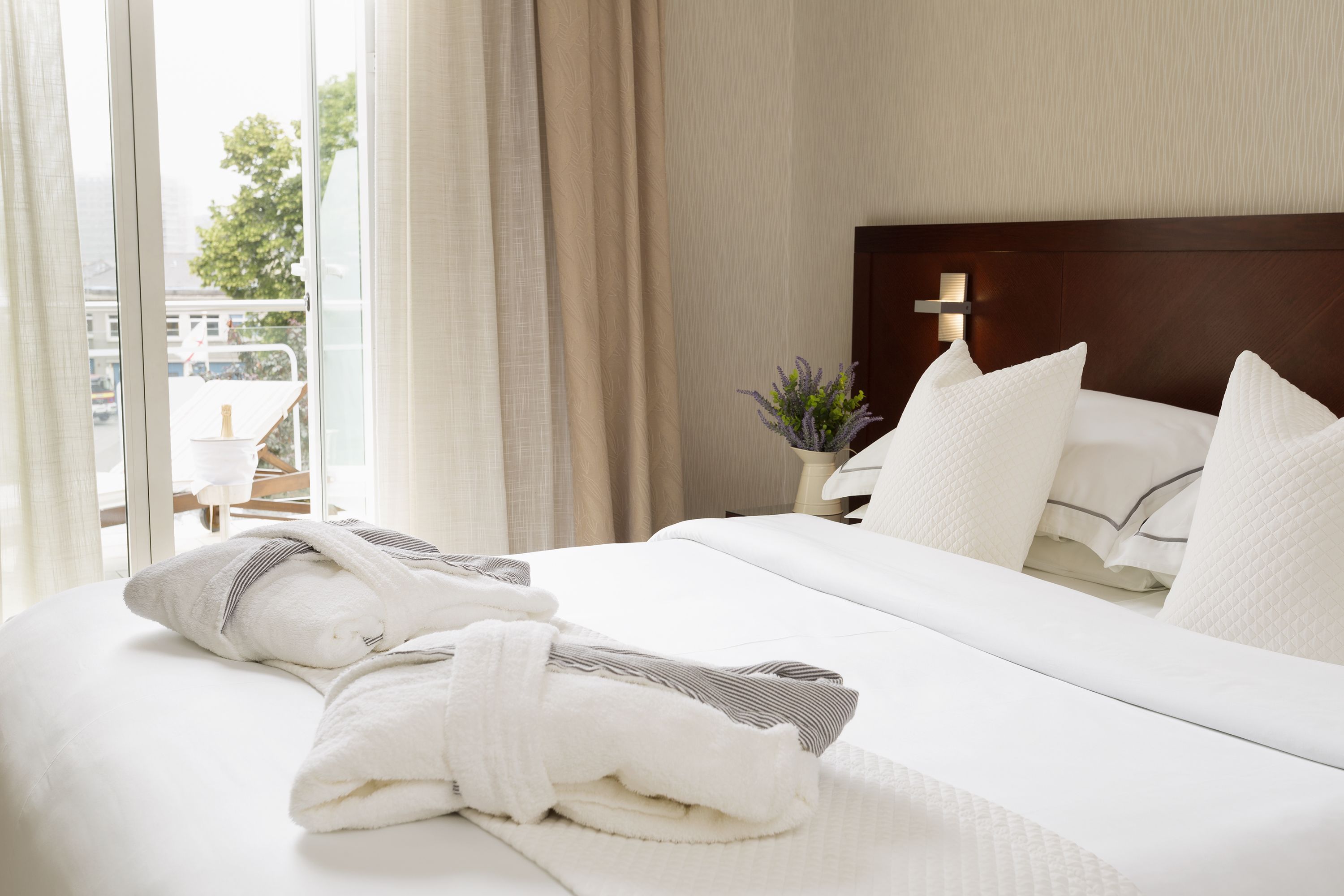 hypo-allergenic bedding, pillow-top beds, in-room safe, desk