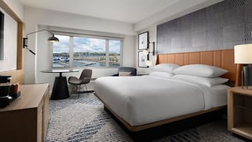 Premium bedding, down comforters, in-room safe, desk