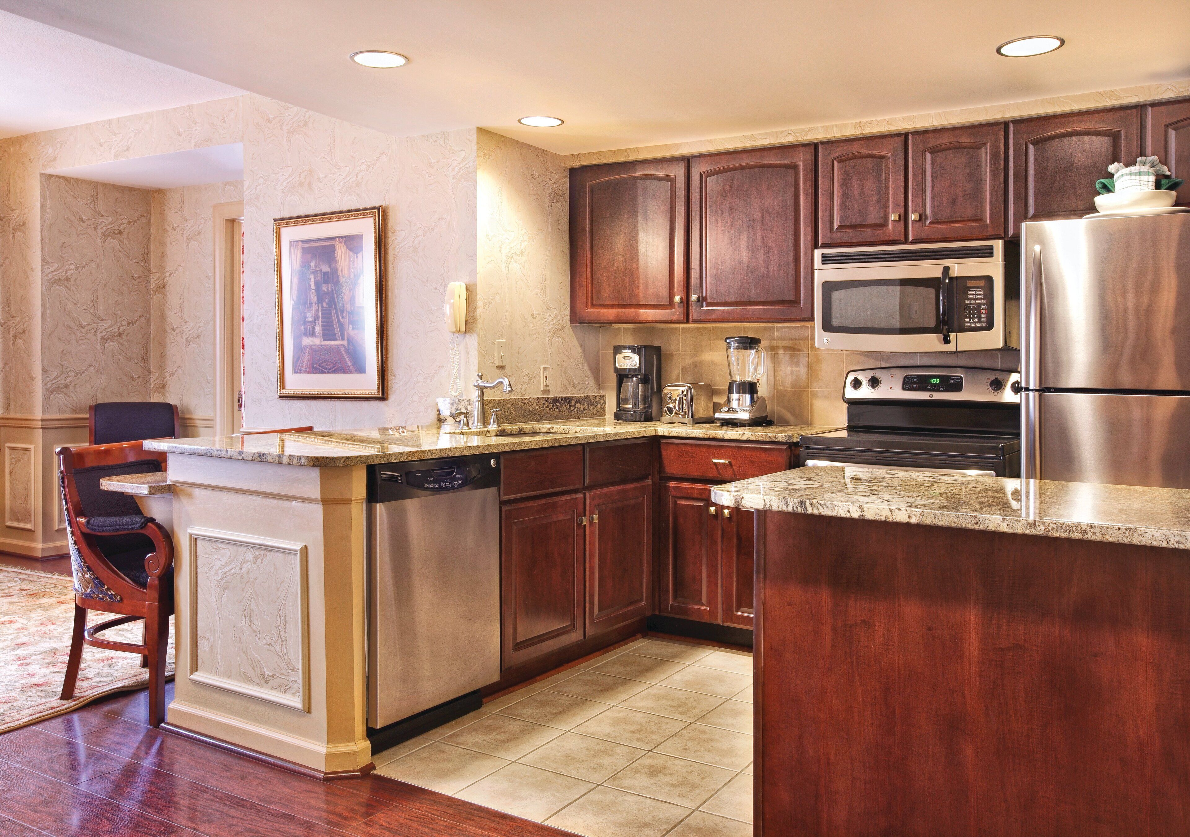 full-sized fridge, microwave, stovetop, dishwasher