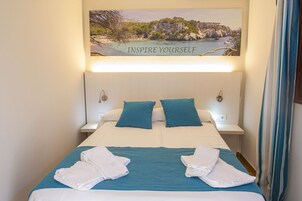 Apartment, 1 Bedroom, Terrace | Down comforters, in-room safe, blackout drapes, iron/ironing board