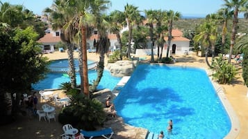 Outdoor pool, open 9:00 AM to 7:00 PM, pool umbrellas, pool loungers