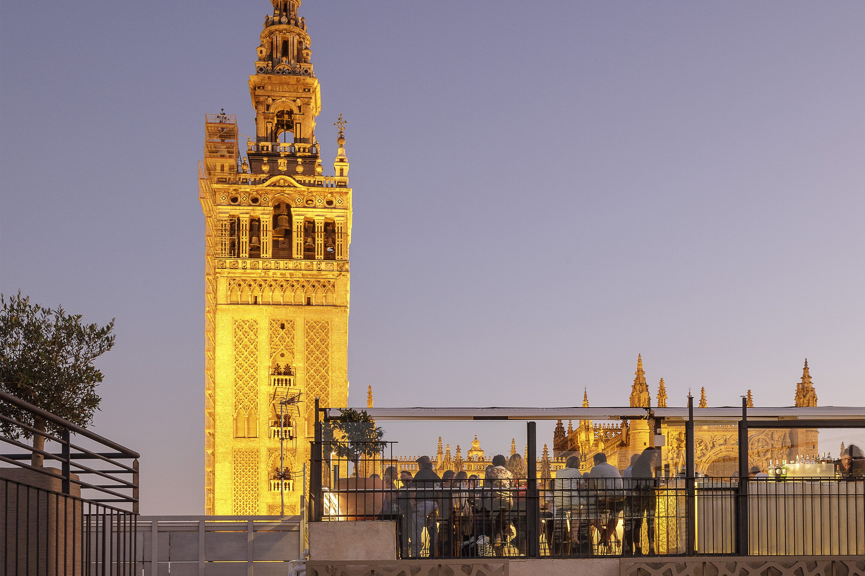 A historic tower with intricate architectural details and a clear view of the surrounding area.