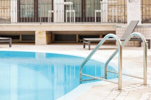 Seasonal outdoor pool, pool umbrellas, sun loungers