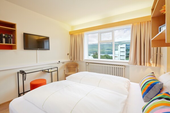 Desk, blackout curtains, free WiFi, bed sheets