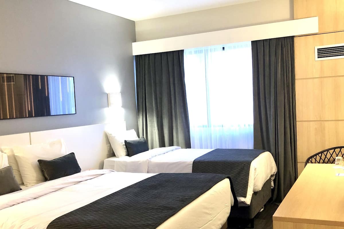 Superior Apartment, Multiple Beds, Balcony | Minibar, in-room safe, desk, soundproofing