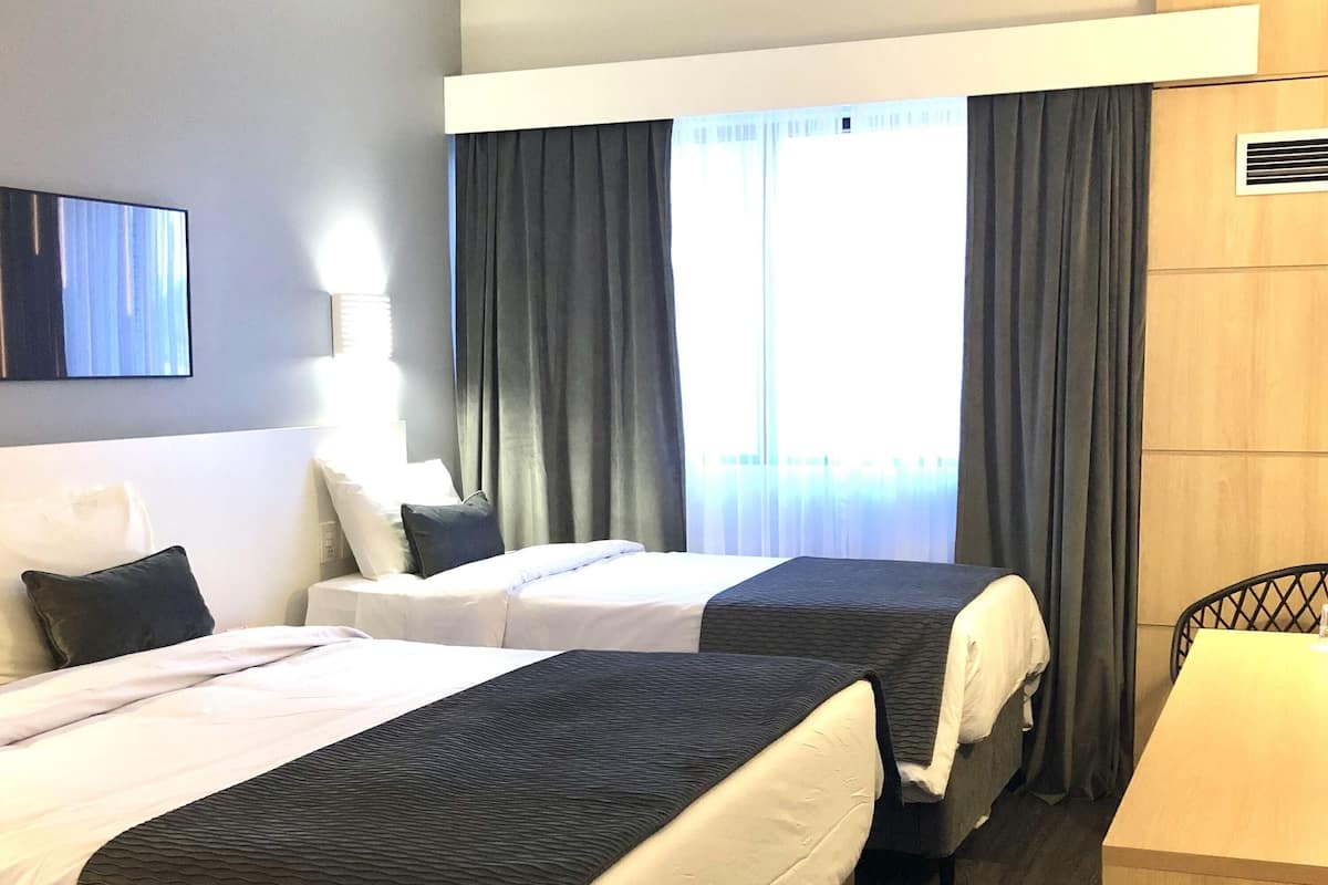 Standard Room, Multiple Beds | Minibar, in-room safe, desk, soundproofing