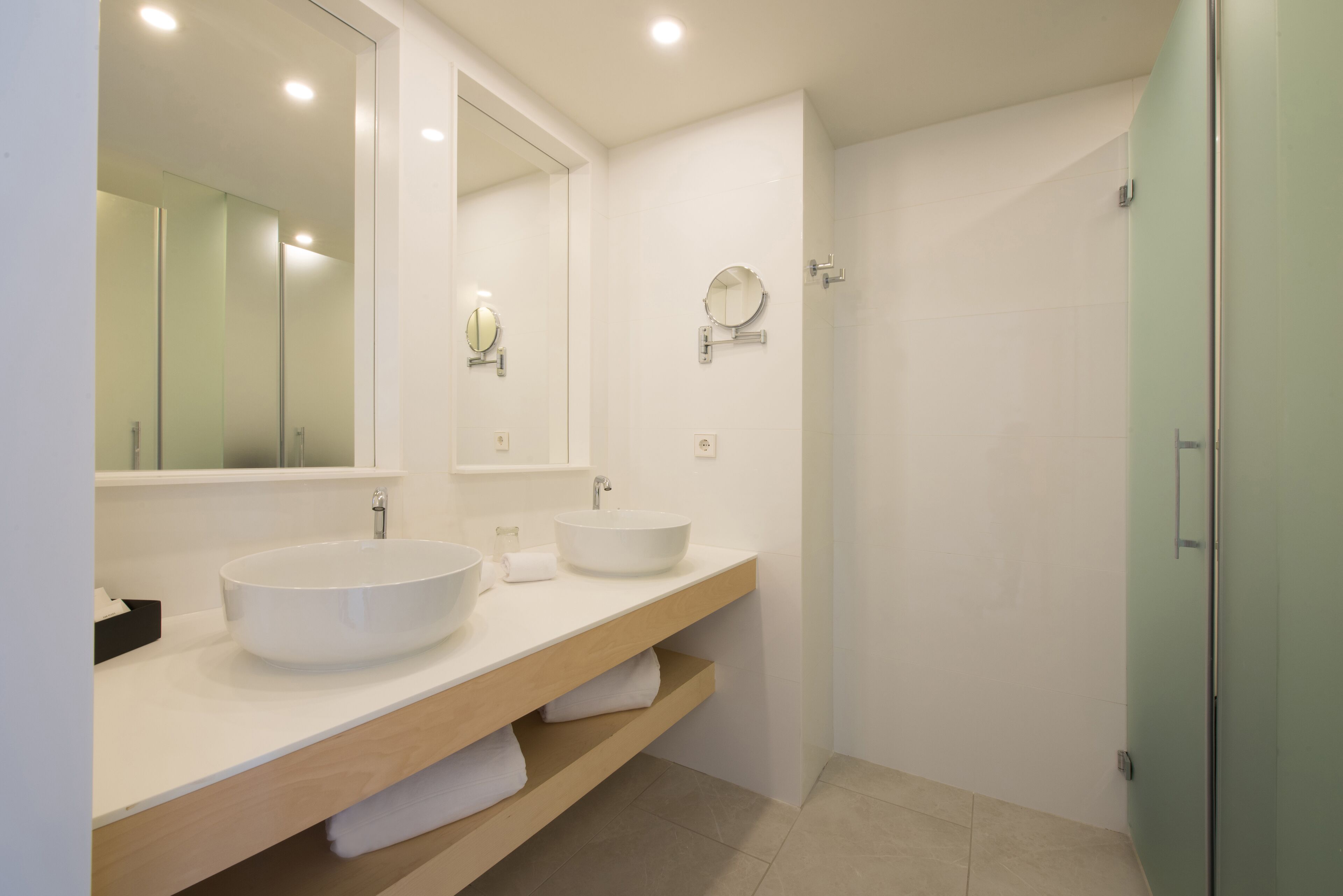 superior double room, beachfront | bathroom | shower, eco-friendly toiletries, hair dryer, bathrobes