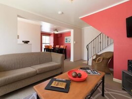 Family Apartment, 2 Bedrooms | Living room | 32-inch flat-screen TV with satellite channels, TV