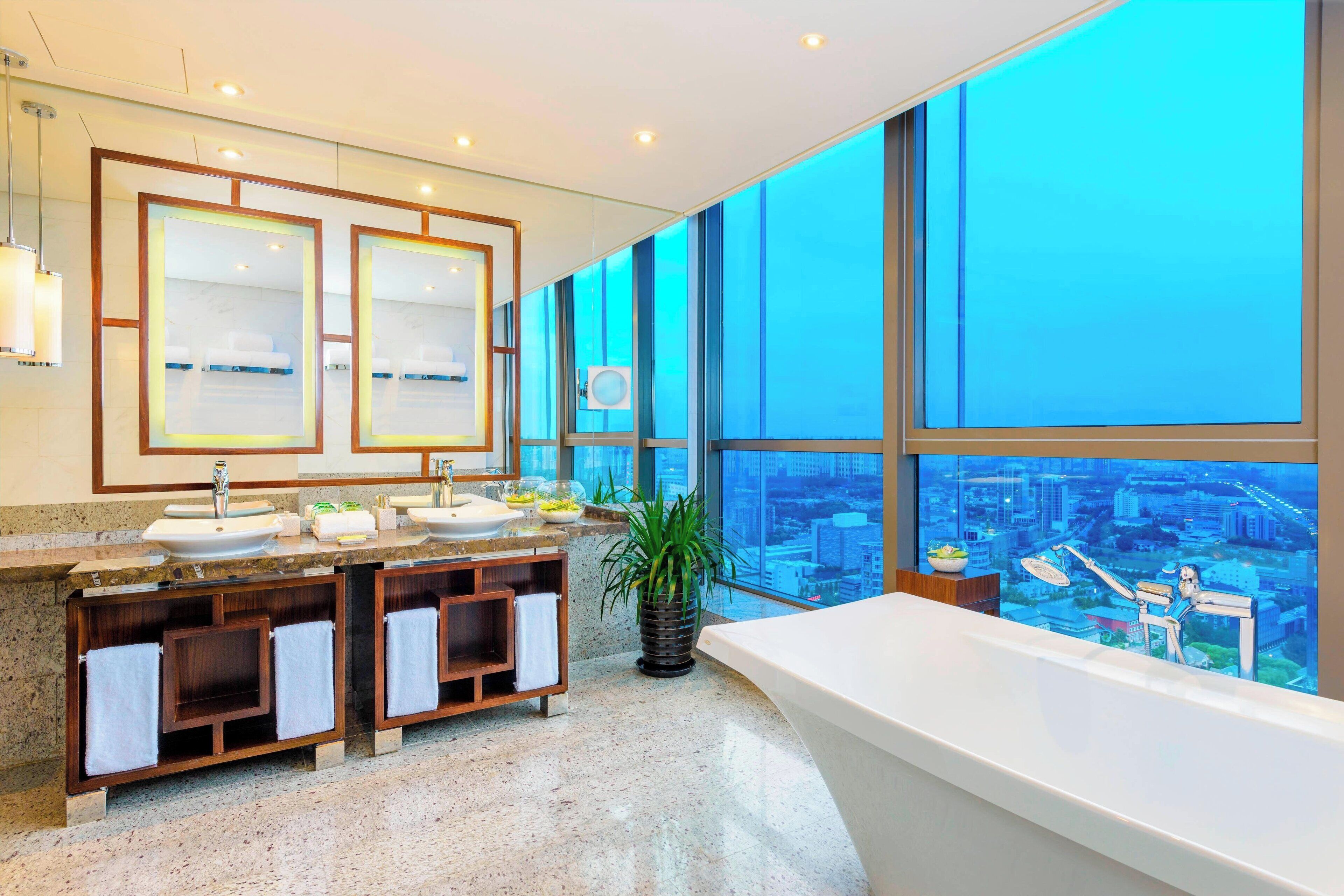 separate bathtub and shower, hair dryer, bathrobes, slippers