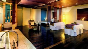 A hotel room with a large bed, a smaller bed, a sitting area with a chair and table, a large window with curtains, and a sink with a mirror. - The Westin Beijing Chaoyang (Beijing)