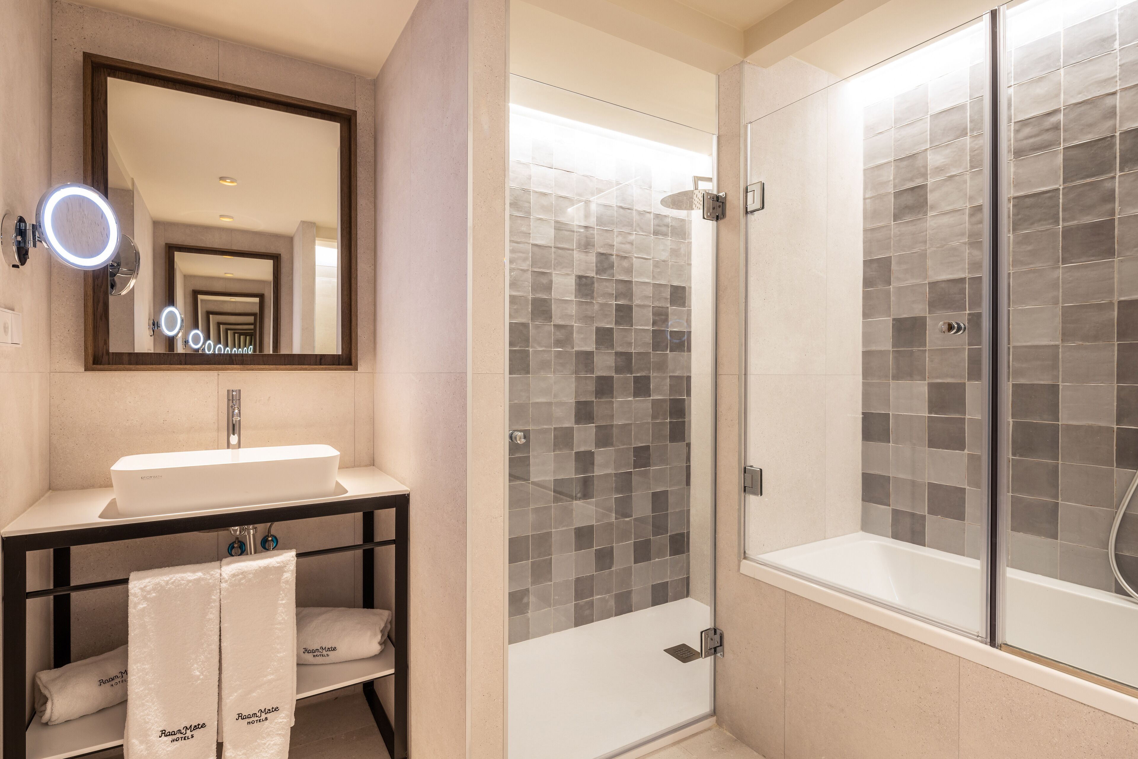 junior suite | bathroom | eco-friendly toiletries, hair dryer, towels, soap