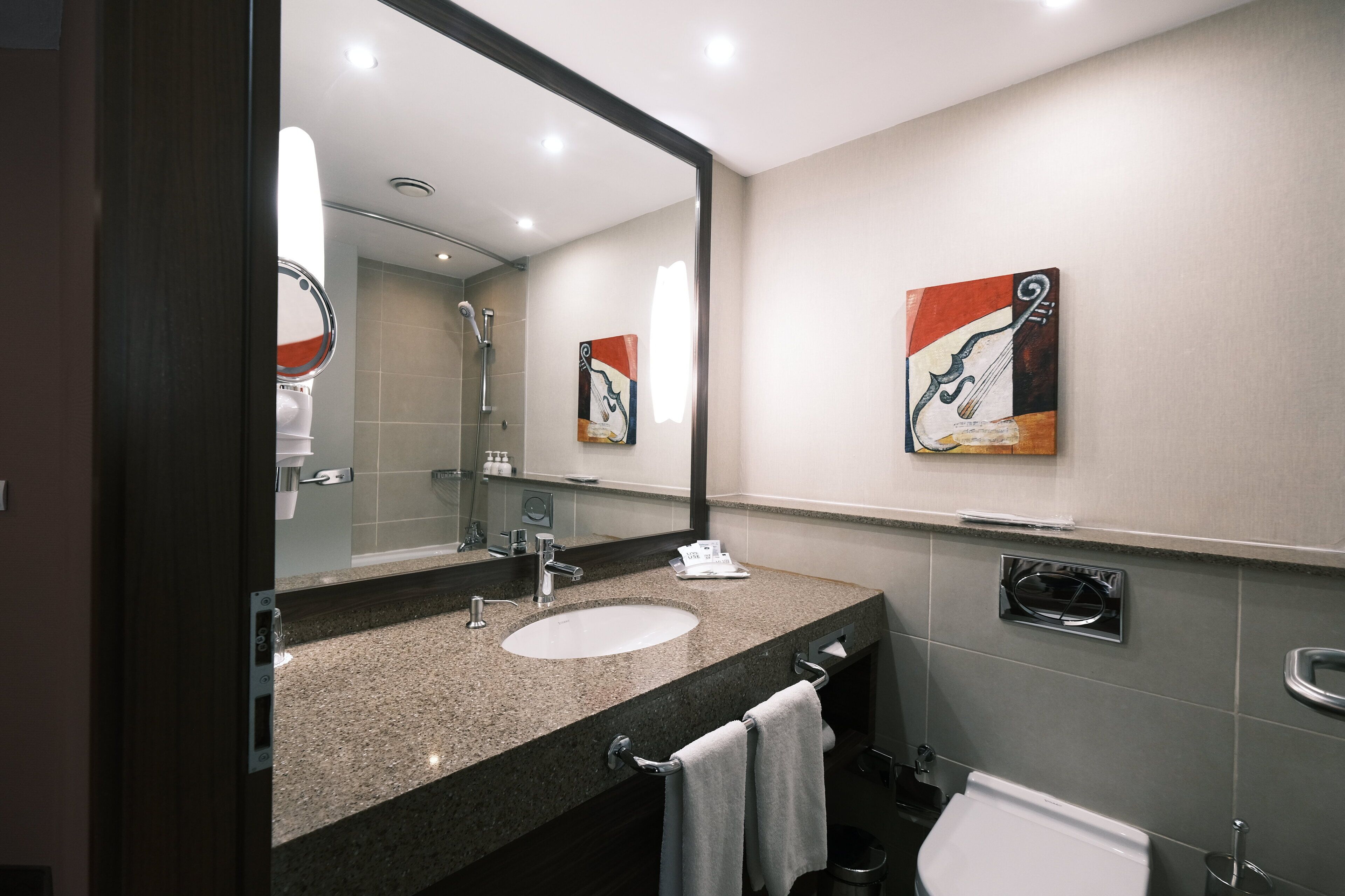 bathtub, free toiletries, hair dryer, slippers