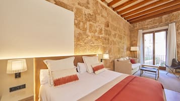 Junior Suite | Minibar, in-room safe, blackout drapes, iron/ironing board (on request)