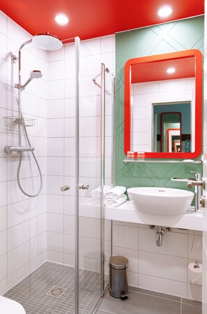 Shower, eco-friendly toiletries, towels, soap