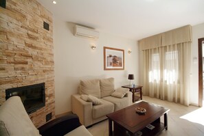 Apartment, 2 Bedrooms (For 4 people - Tickets to Caminito del Rey Included) | Living room | TV - Apartamentos Ardales (Ardales)