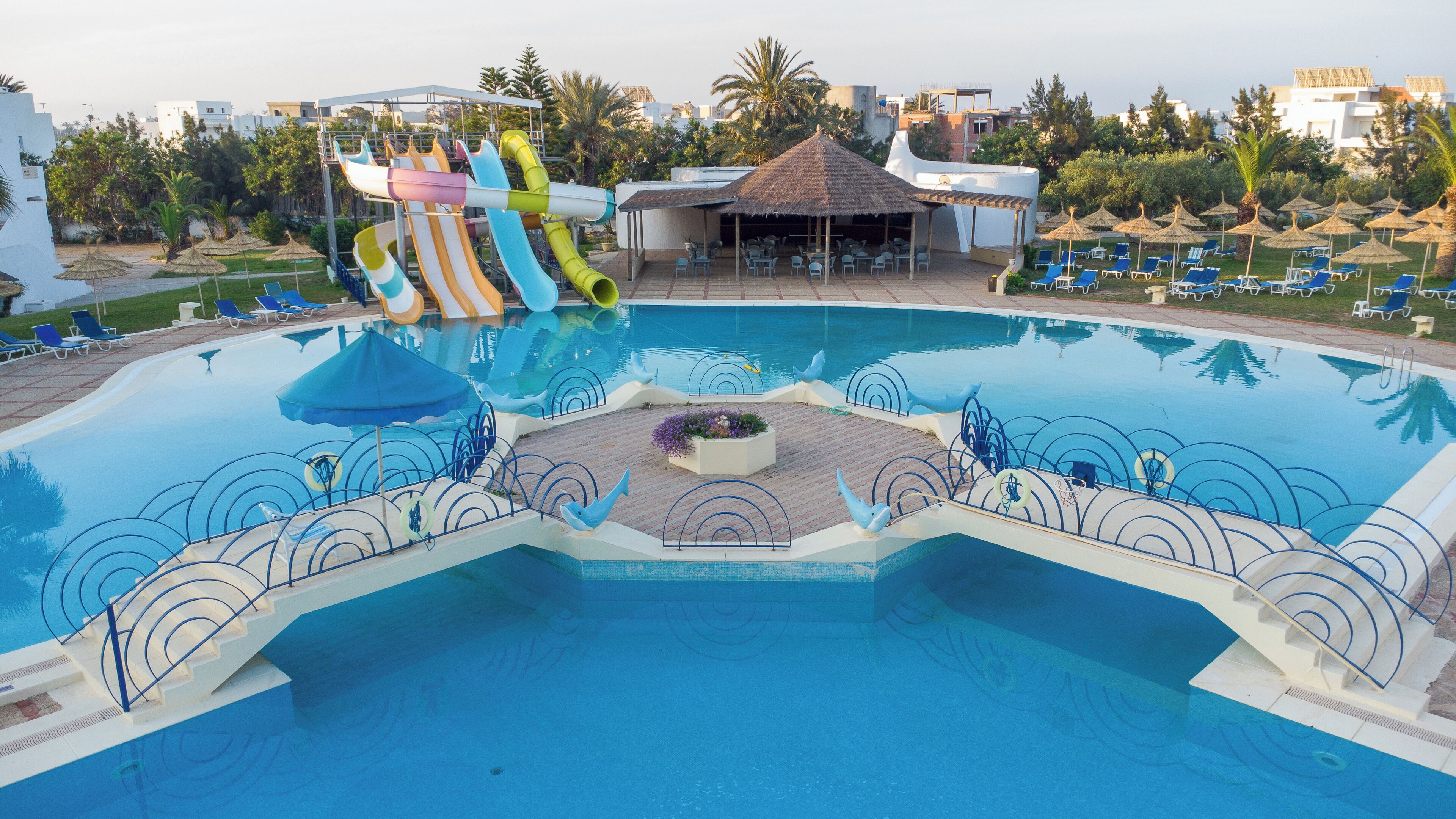 indoor pool, outdoor pool, pool loungers