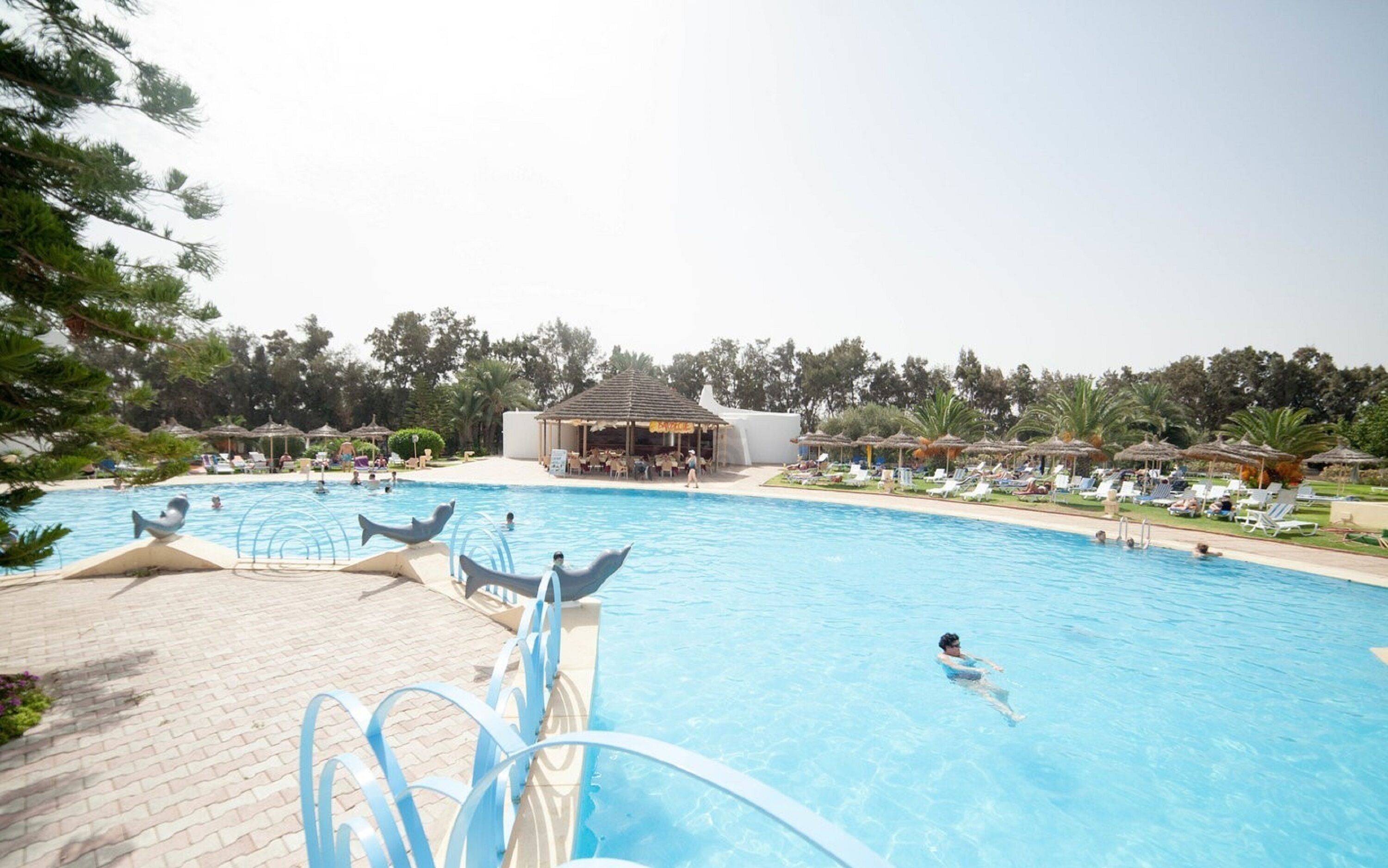 indoor pool, outdoor pool, pool loungers