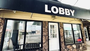 A building with a sign reading "LOBBY" above the entrance. - Okanagan Seasons Resort (Kelowna)