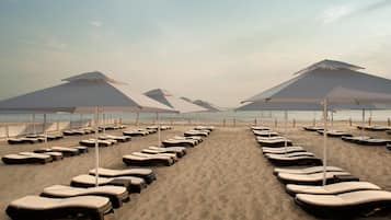 Private beach, sun loungers, beach umbrellas, beach towels