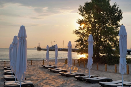 Private beach, sun loungers, beach umbrellas, beach towels